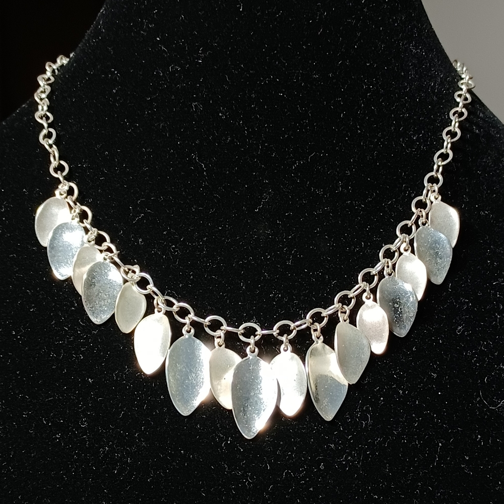 SILVER TONE STARBURST NECKLACE